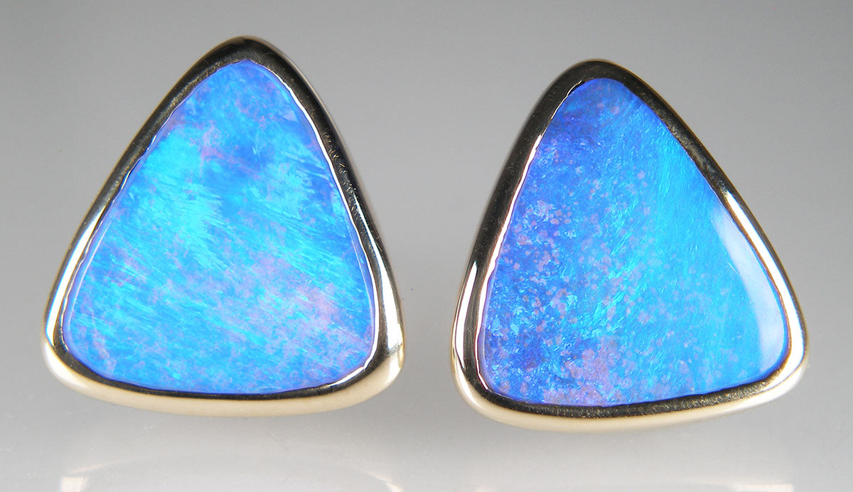 Boulder opal earstuds in 18ct yellow gold