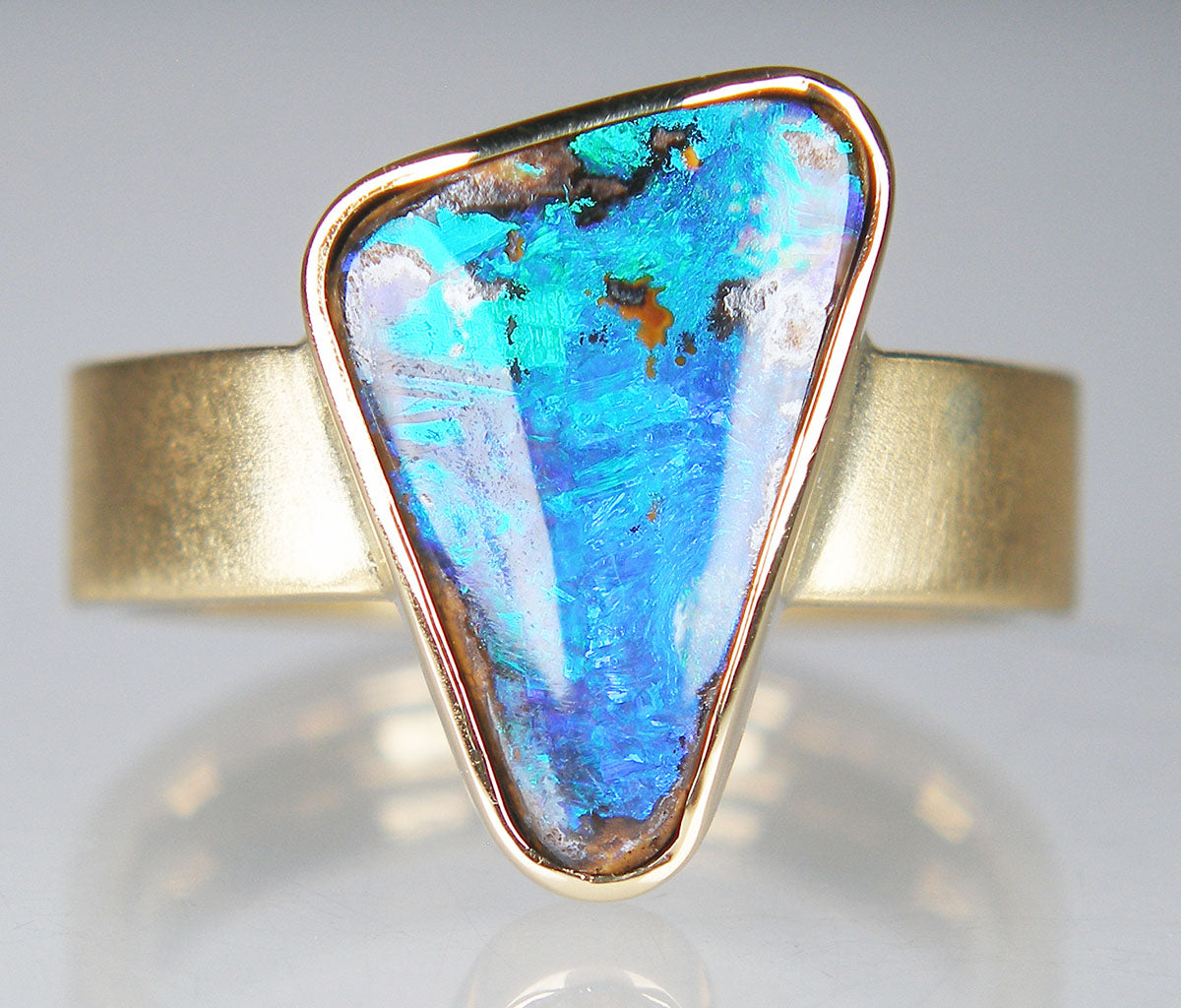 Boulder opal ring in 18ct yellow gold