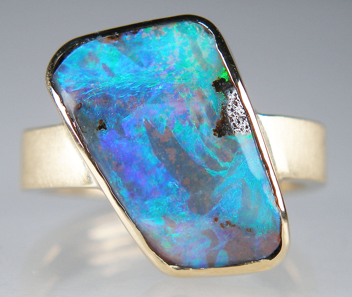 Boulder opal ring in 9ct yellow gold