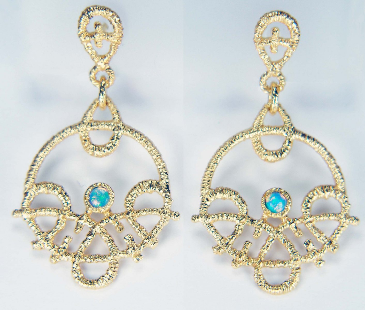 Crystal opal Brigitte Adolf eardrops in 18ct yellow gold
