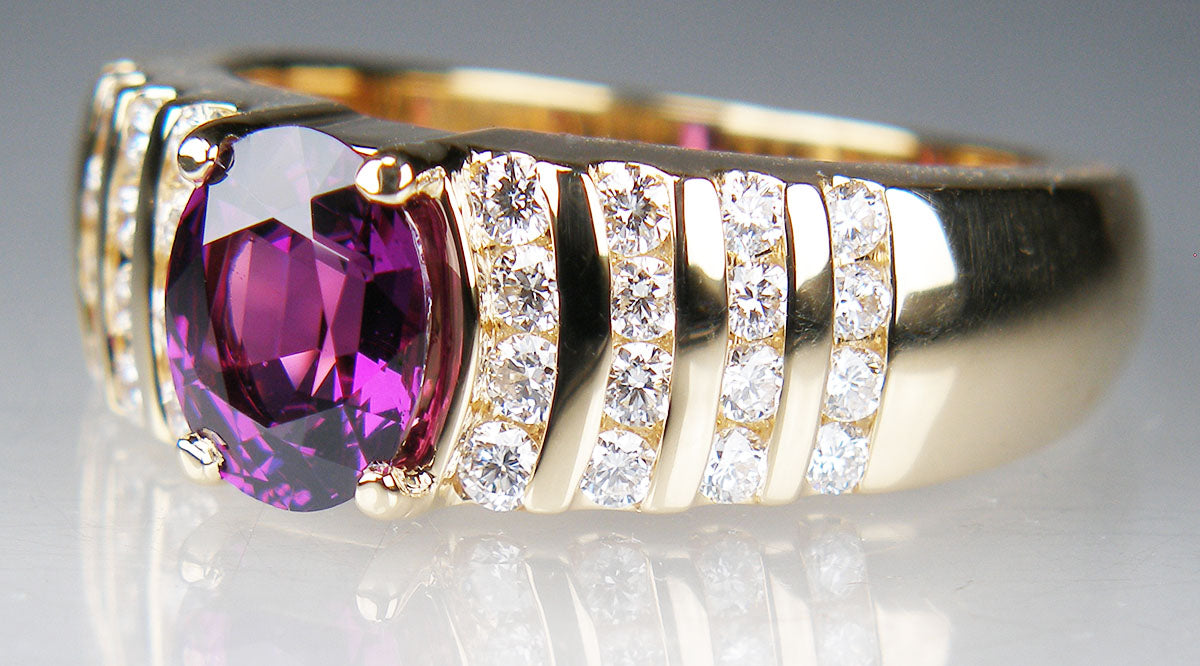 Purple rhodolite garnet & diamond ring in 18ct yellow gold