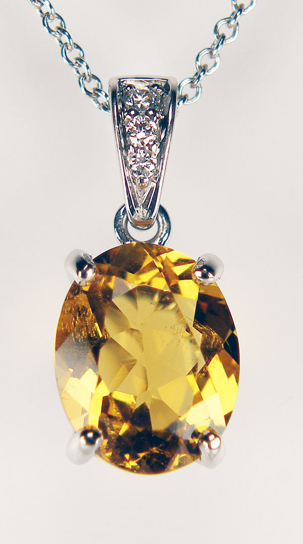 Golden beryl & diamond pendant in platinum