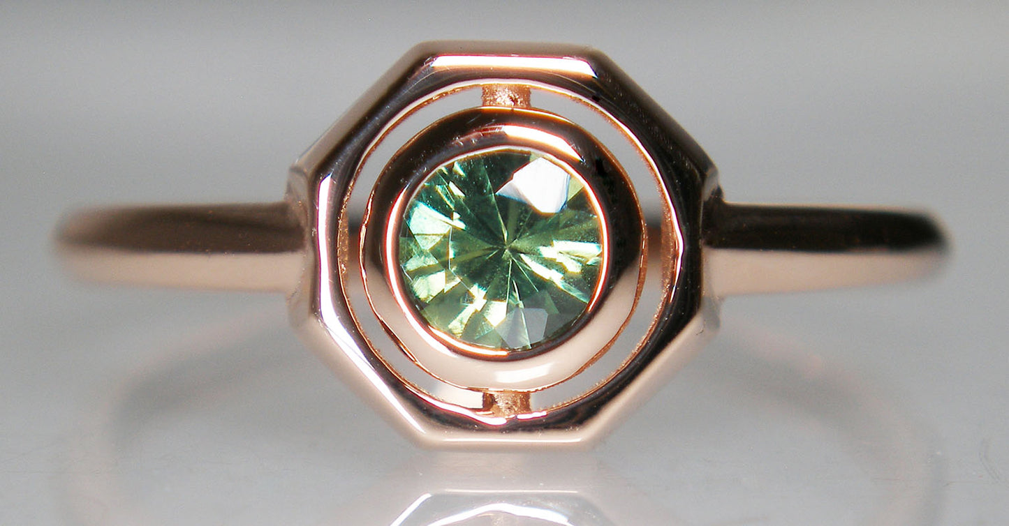 Green sapphire rubover ring in 18ct rose gold