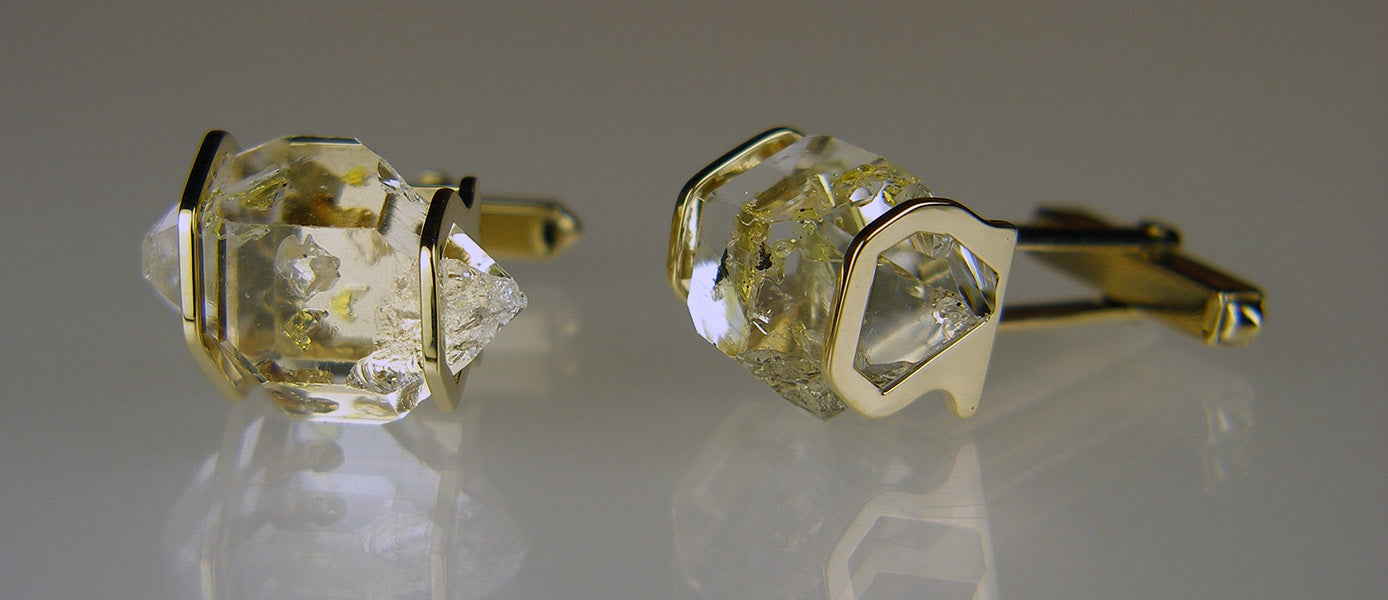 Rare oil included quartz crystals in 9ct yellow gold