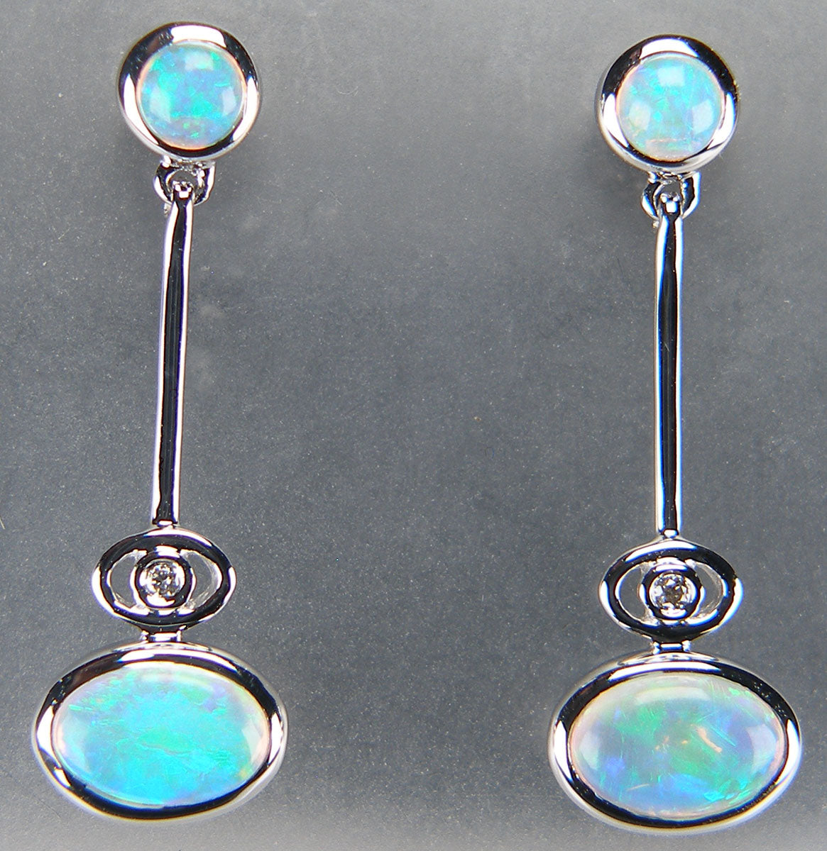Opal earrings in 18ct white gold