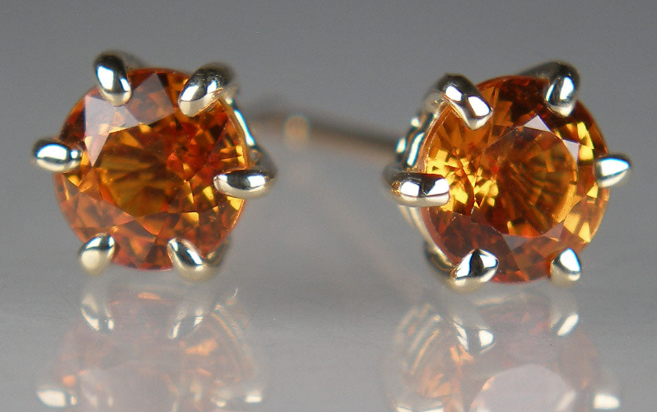 Orange sapphire earstuds in 9ct yellow gold