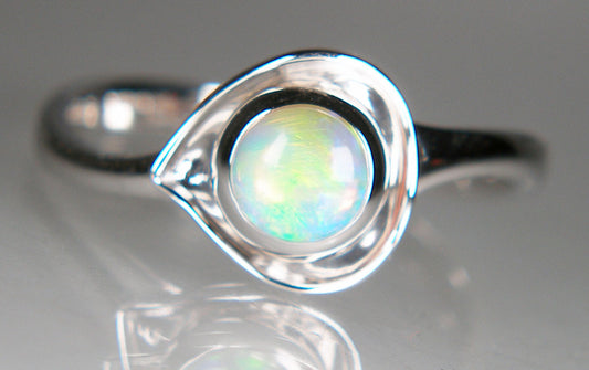 Opal & diamond ring in 18ct white gold