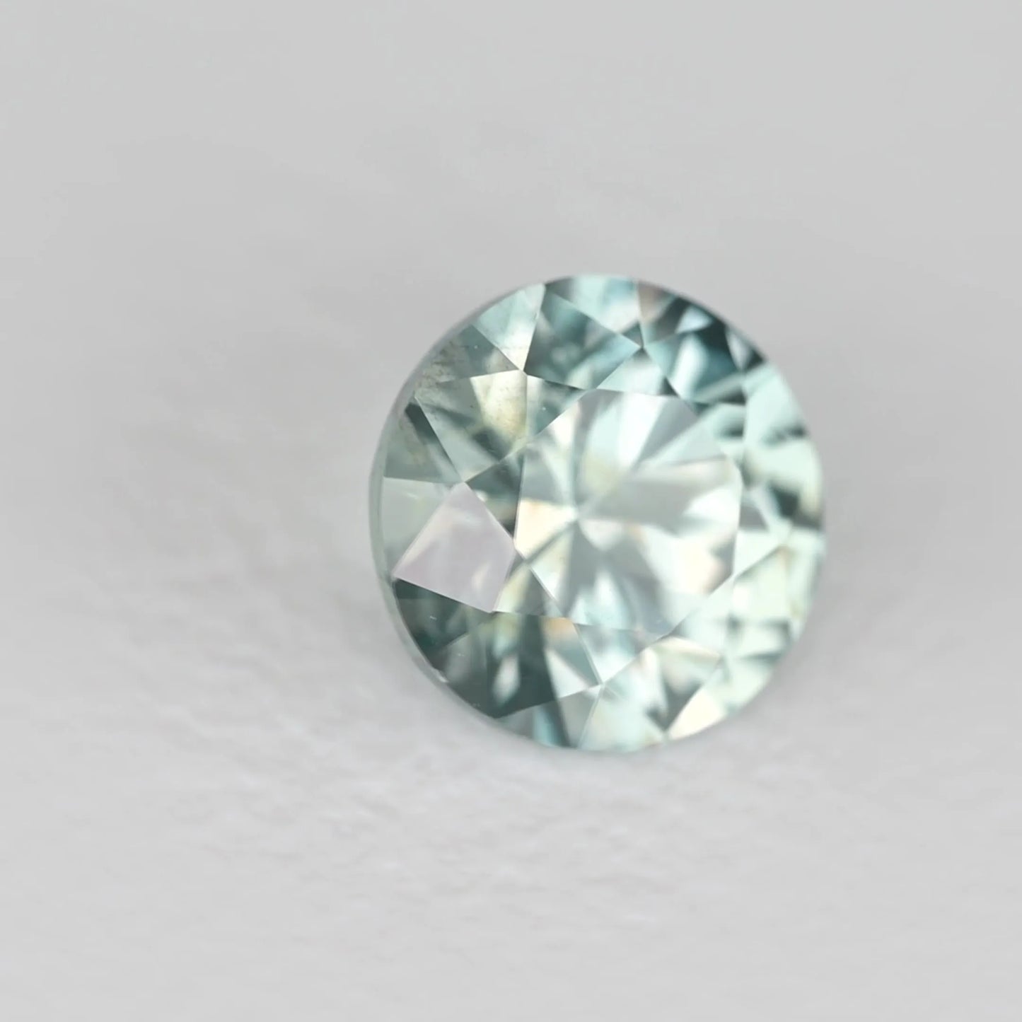 0.65ct Round Natural Sapphire (Colour Teal, Clarity Eye Clean, Cut Faceted)