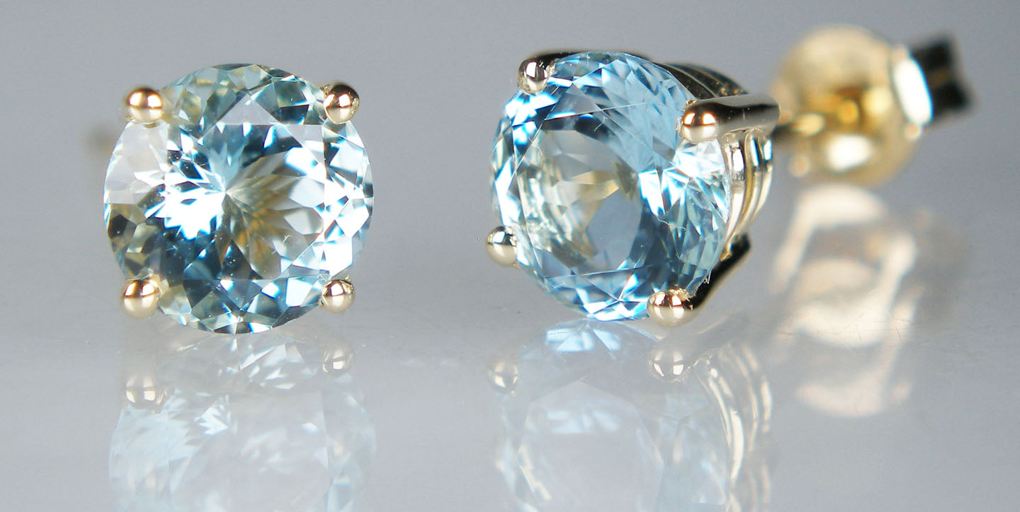 Aquamarine studs in 9ct yellow gold