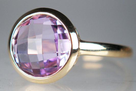 Chequerboard cut amethyst ring in 14ct yellow gold