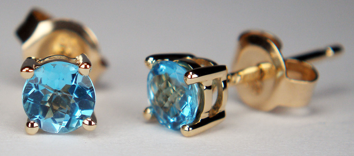 Blue topaz earstuds in 14ct yellow gold