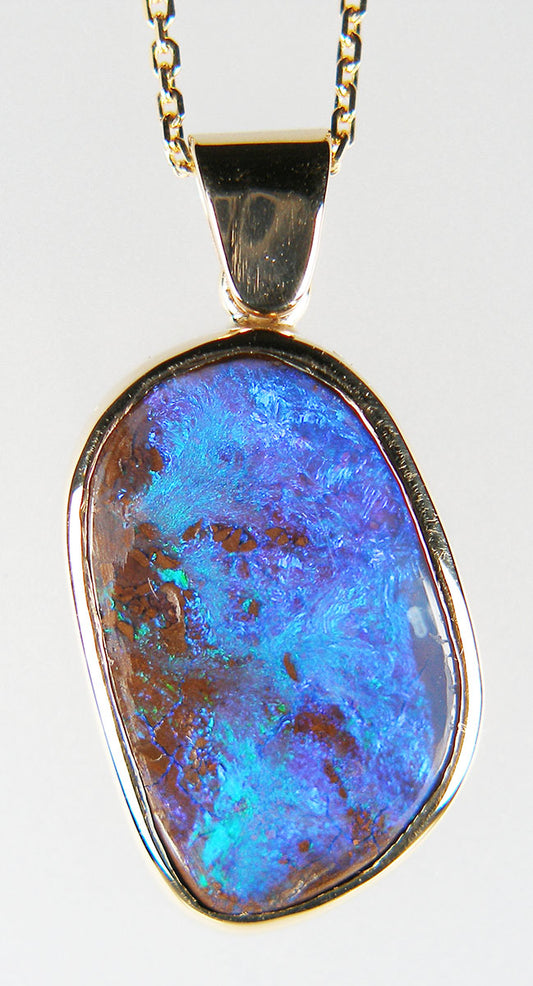 Boulder opal pendant in 9ct yellow gold