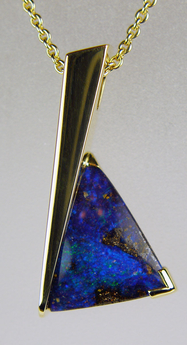 Boulder opal pendant in 18ct yellow gold