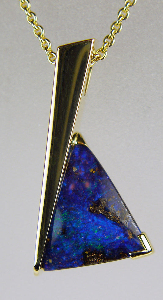 Boulder opal pendant in 18ct yellow gold