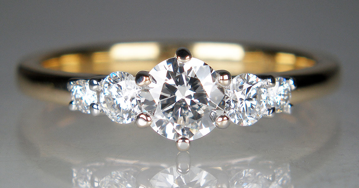 0.68ct five stone diamond ring in 18ct yellow gold