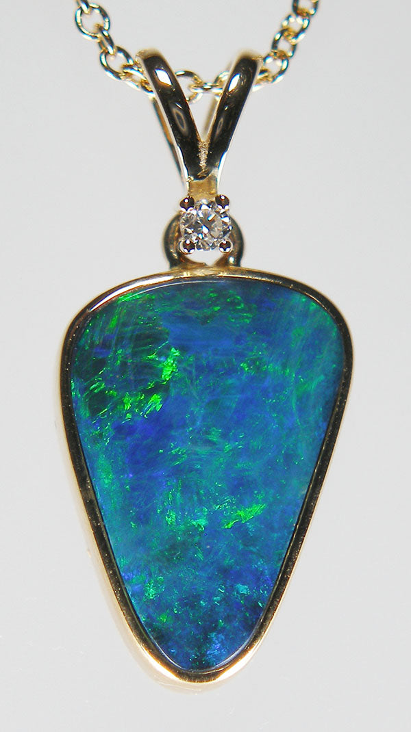 Doublet opal & diamond pendant in 9ct yellow gold