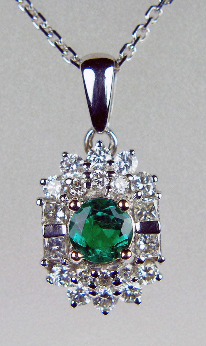 Emerald & diamond pendant in 18ct white gold