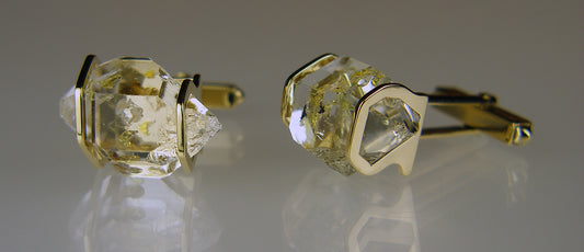 Rare oil included quartz crystals in 9ct yellow gold