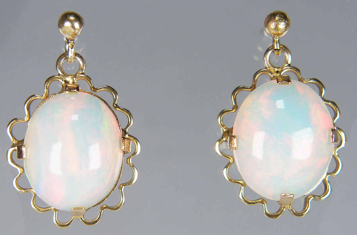 Opal eardrops in 9ct yellow gold