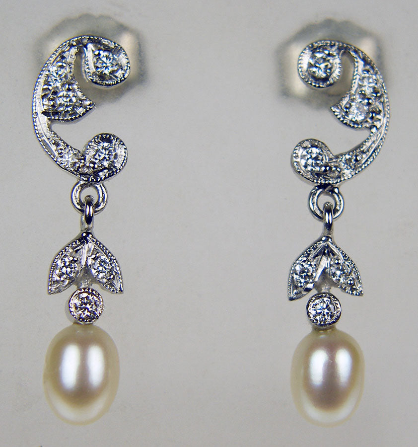 Dainty pearl & diamond earrings in 18ct white gold