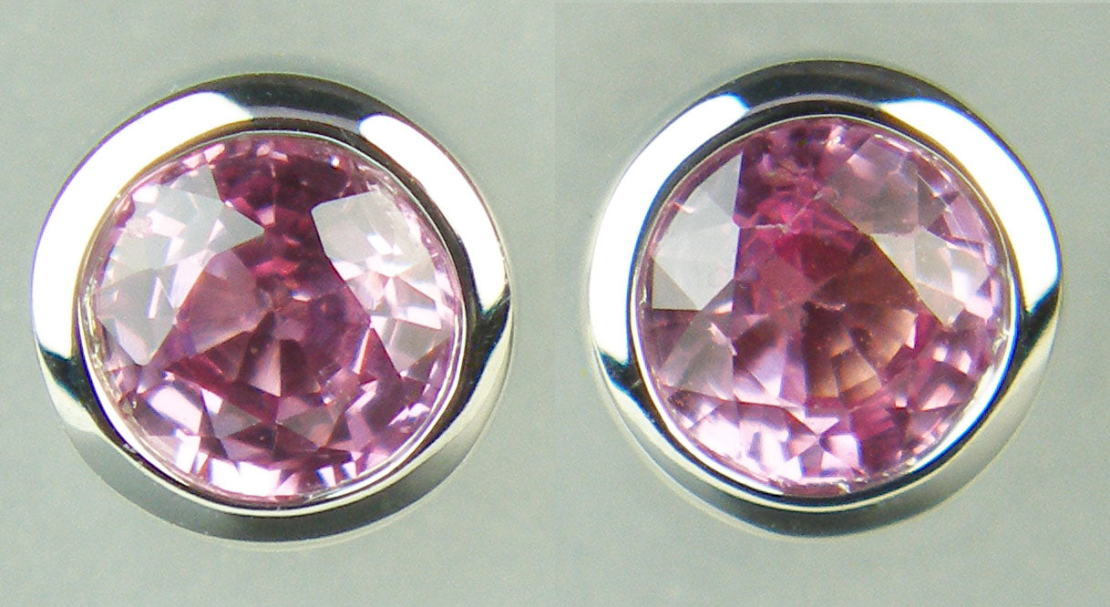 Pink sapphire earstuds in 9ct white gold