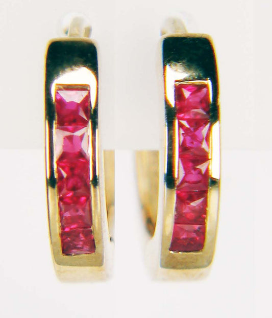 Ruby huggie earshoops in 9ct yellow gold