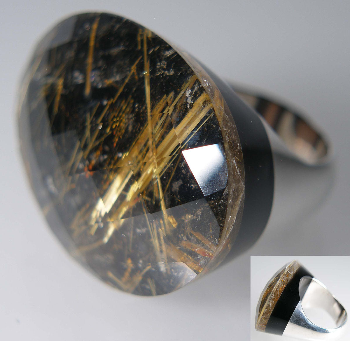 Rutilated quartz ring in silver