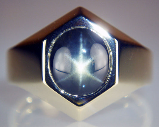 Grey star sapphire ring in 14ct yellow gold