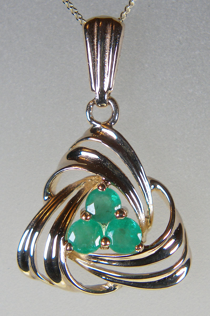 Emerald knot style pendant in 9ct yellow gold