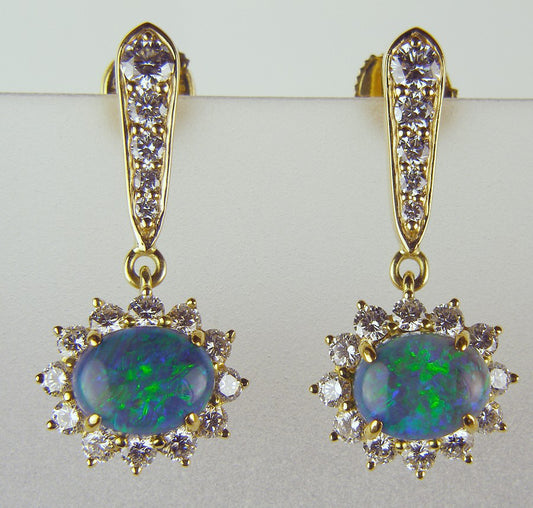 Black opal drop earrings in 18ct gold