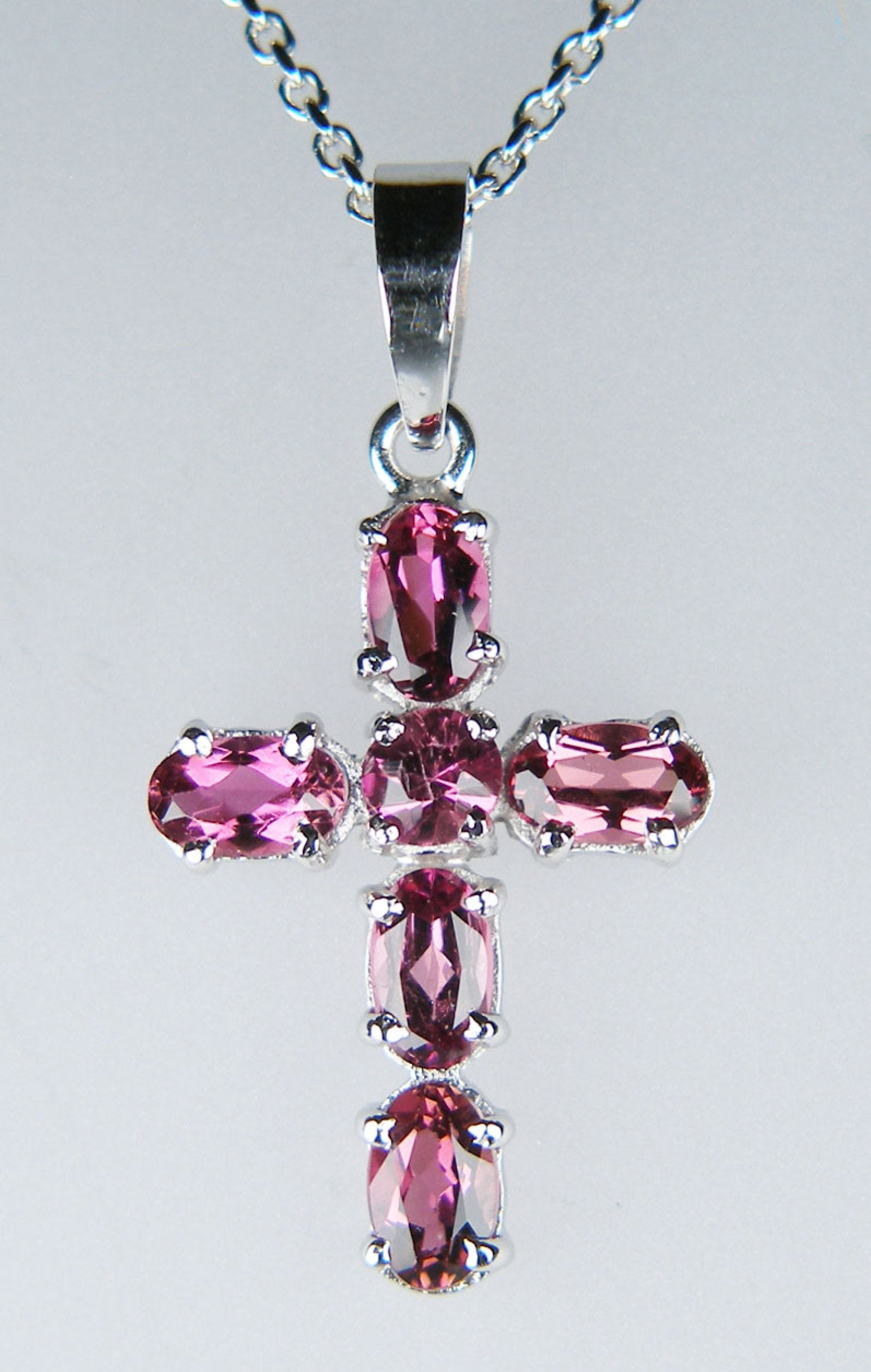 Pink tourmaline cross in 14ct white gold